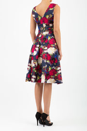 model wearing the Aldeburgh Print swing Dress with v-neck short sleeve back image