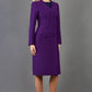 blonde model wearing the Diva Silverstone Coat with V neckline in imperial purple front image
