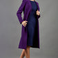 blonde model wearing the Diva Silverstone Coat with V neckline in imperial purple front image