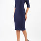 model is wearing diva catwalk seed amalfi plain pencil dress with high v-neck and sleeves in navy blue front