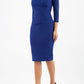 Model wearing the Diva Chelsea Pencil dress with V neckline and three-quarter sleeves in oxford blue front image
