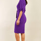 brunette model wearing diva catwalk tryst pencil purple dress with sleeves and belt detail at the front with rounded neckline front