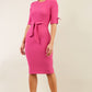 brunette model wearing diva catwalk tryst pencil pink dress with sleeves and belt detail at the front with rounded neckline front