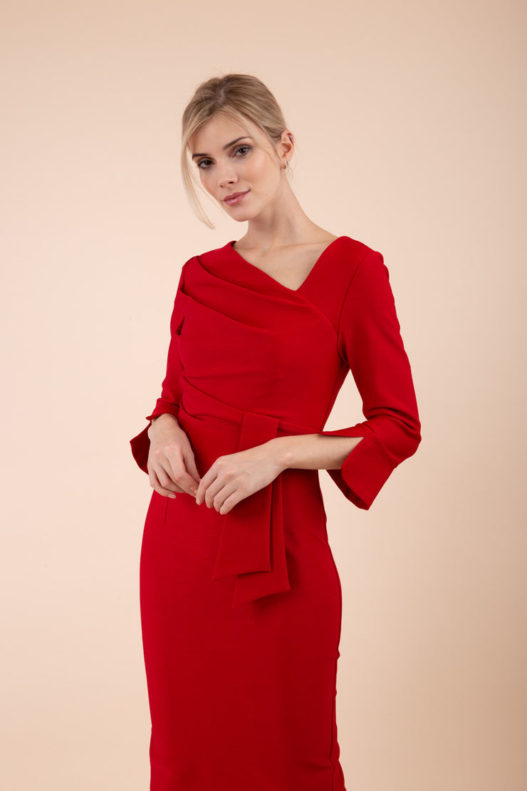 Model wearing diva catwalk Seed Orla Asymmetric Pencil Dress in Cardinal Red front