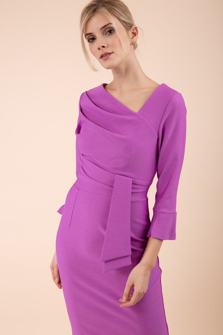 Model wearing diva catwalk Seed Orla Asymmetric Pencil Dress in Magenta Mist front side