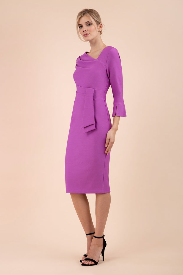 Model wearing diva catwalk Seed Orla Asymmetric Pencil Dress in Magenta Mist front side