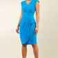 brunette model is wearing diva catwalk velvet pencil dress with V-neck and wrap skirt in blue jewel front