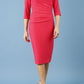 model is wearing diva catwalk seed axford pencil sleeved dress with rounded folded collar in opera pink front