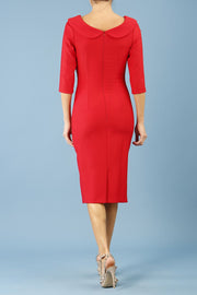 model is wearing diva catwalk seed axford pencil sleeved dress with rounded folded collar in salsa red back