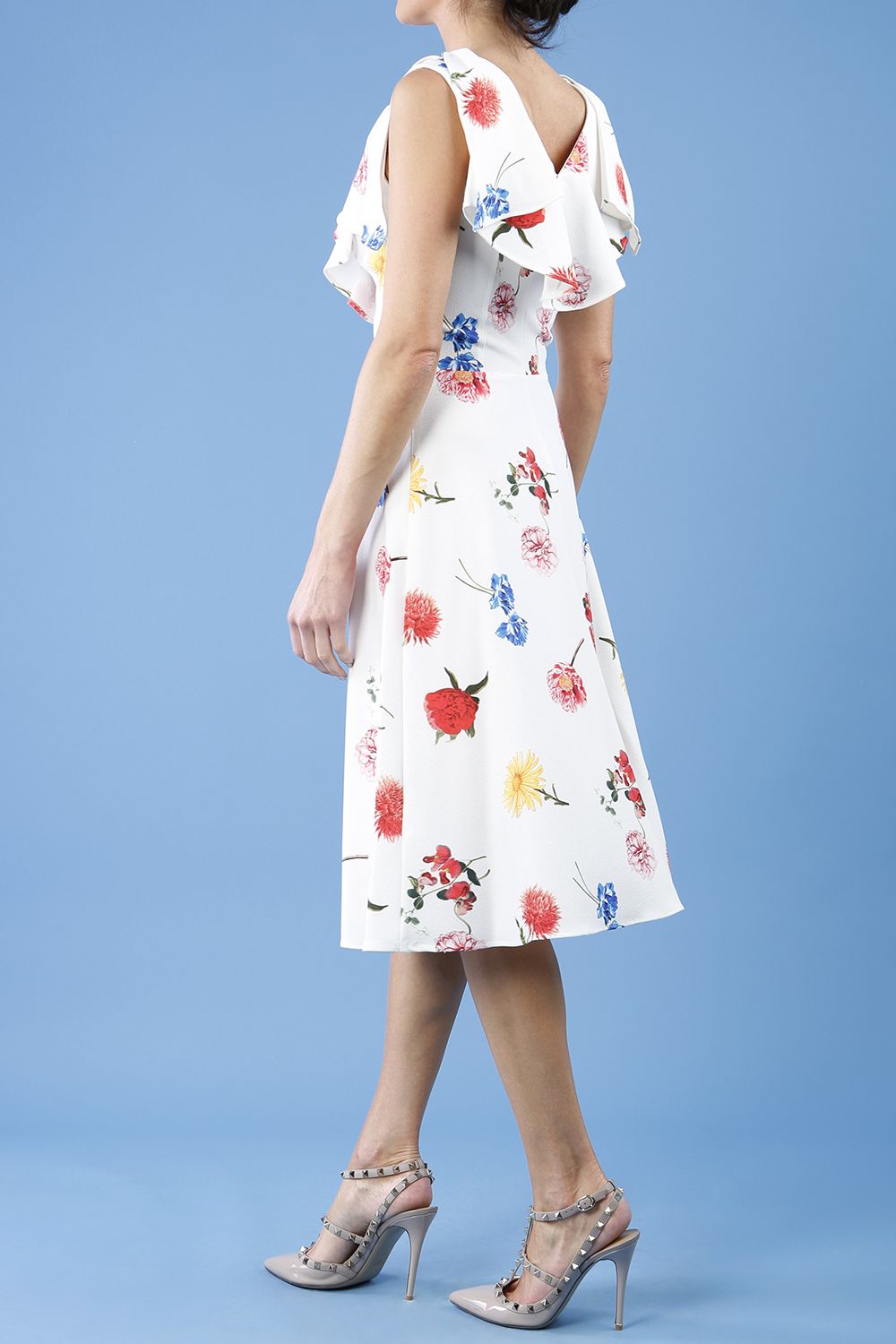 model is wearing diva catwalk layla a-line swing printed dress without sleeves in buttercup print back