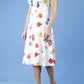 model is wearing diva catwalk layla a-line swing printed dress without sleeves in buttercup print front