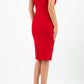 brunette model wearing diva catwalk evening pencil skirt dress sleeveless with lowered neckline and pleating on side in scarlet red  colour back