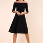 brunette model is wearing diva catwalk off shulder swing a-line islay dress with sleeves in black front