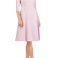  blonde model wearing diva catwalk romney three quarter sleeve swing dress with a band in dawn pink front