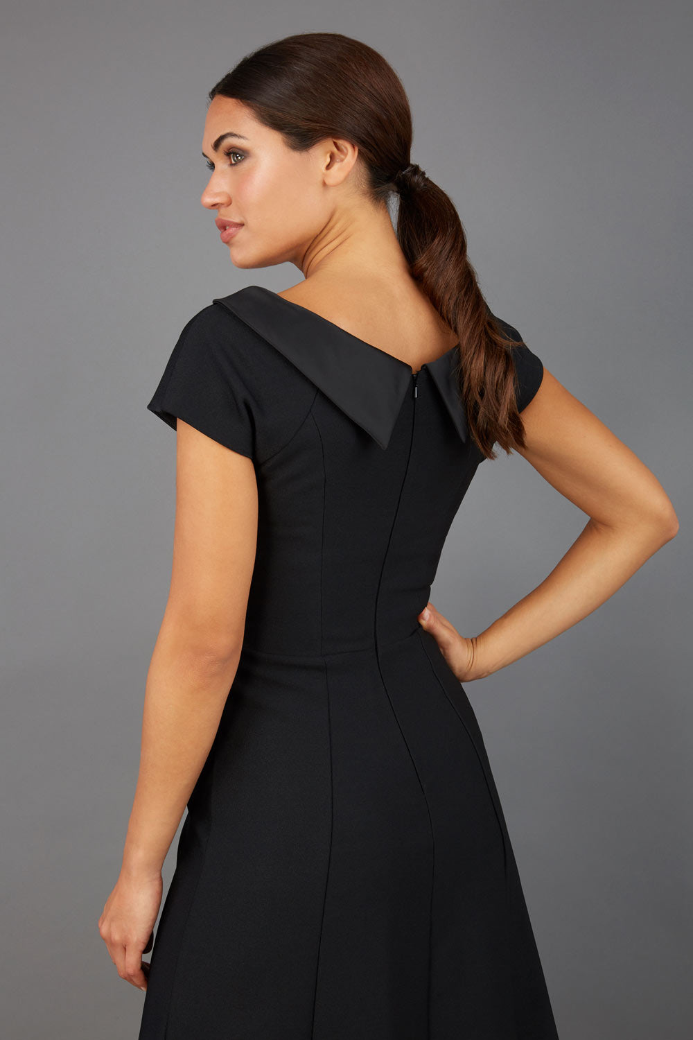 model wearing a diva catwalk Bowmore V-Neck A-line Dress cap sleeve in black colour