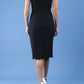 model wearing diva catwalk little black dresses with low v-nwcklinw and pencil skirt sleeveless style back