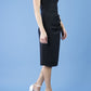 model wearing diva catwalk little black dresses with low v-nwcklinw and pencil skirt sleeveless style front