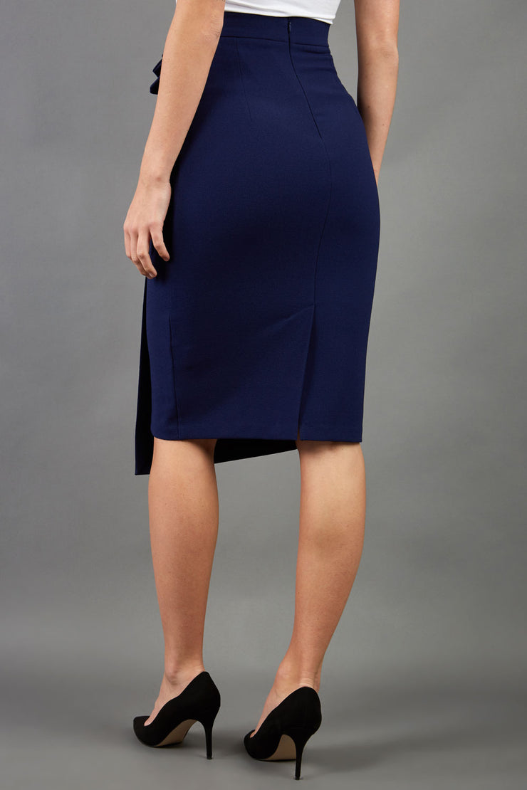 model is wearing diva catwalk antibe pencil asymmetric skirt with pleating at the front in navy back