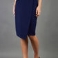 model is wearing diva catwalk antibe pencil asymmetric skirt with pleating at the front in navy front