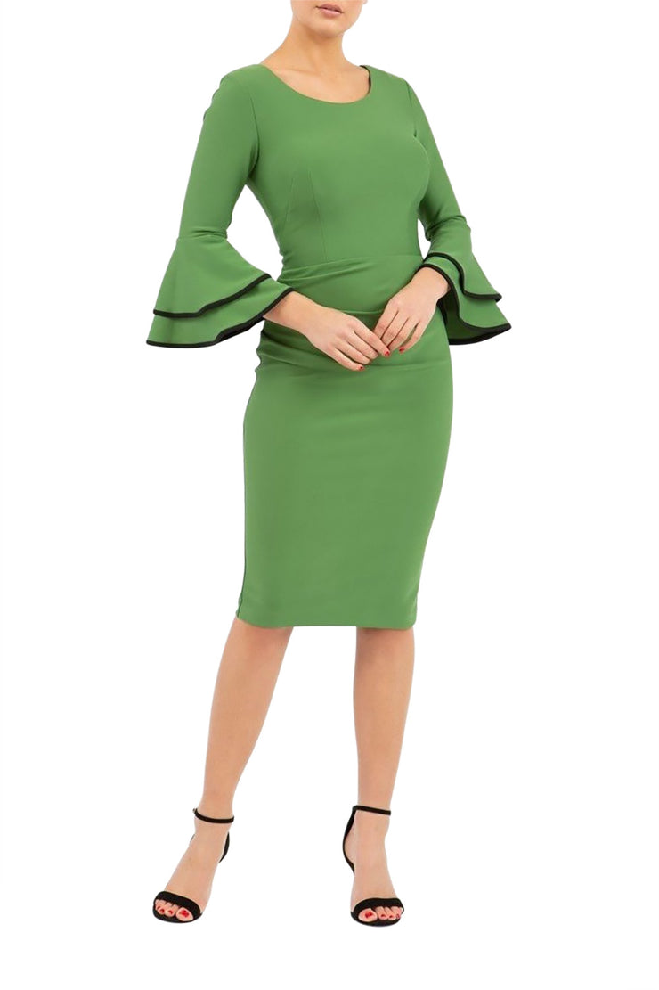 blonde model wearing diva catwalk tina pencil skirt dress with rounded neckline and flute sleeve in vineyard green front