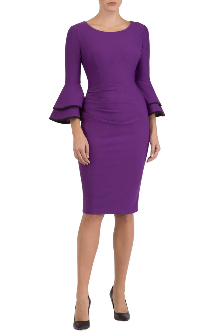 blonde model wearing diva catwalk tina pencil skirt dress with rounded neckline and flute sleeve in royal purple front