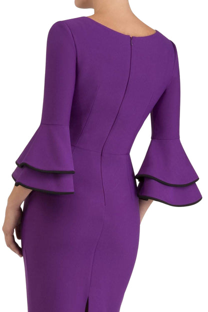 blonde model wearing diva catwalk tina pencil skirt dress with rounded neckline and flute sleeve in royal purple back