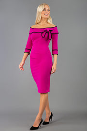 A Model is wearing an off shoulder three quarter sleeve pencil dress in pink by diva catwalk