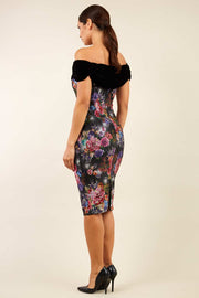 model wearing diva catwalk verdana matilda jaquard pencil-skirt fitted dress print and black velvet bardot neckline sleeveless and knee length 