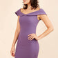 brunette model wearing diva catwalk juilet midaxi pencil sleeveless off shoulder dress with open neck and folded collar in colour mauve purple front