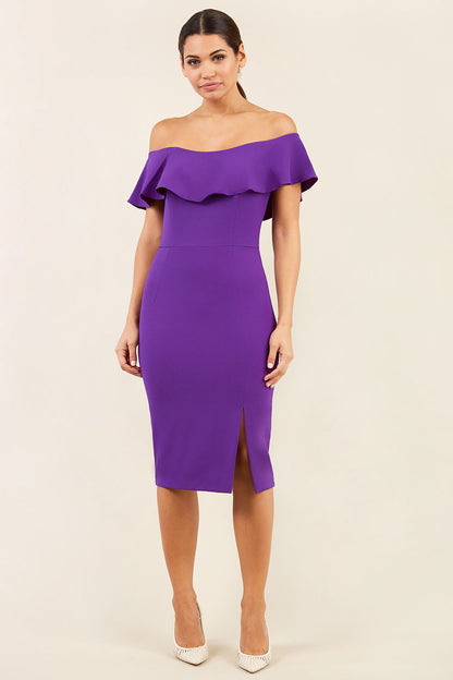 brunette model wearing diva catwalk pencil dress with off shoulder frilled front and bardot neckline in passion purple colour front