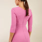 model wearing diva catwalk helston begonia pink pencil skirt dress with sleeves and cut out detail on the neckline back