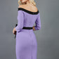 blonde model wearing diva catwalk luma pencil skirt dress with contrasting bow off shoulder with sleeves in lilac wisteria back