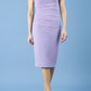 model is wearing diva catwalk polly cap sleeve pencil dress with rounded neckline at the front and deep lowered rounded cutout at the back in chalk purple front