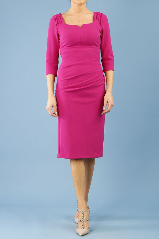 model is wearing diva catwalk ferndown pencil sleeved dress with sweetheart neckline in magenta haze colour front