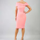 blonde model is wearing diva catwalk mariposa pencil dress with Detailed Bardot neckline with fold-over detail and pleated at waist area in flamingo pink front