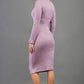 blonde model wearing diva catwalk elstar pencil plain dress made of very soft and cosy cashmere fabric with long sleeves in pink back