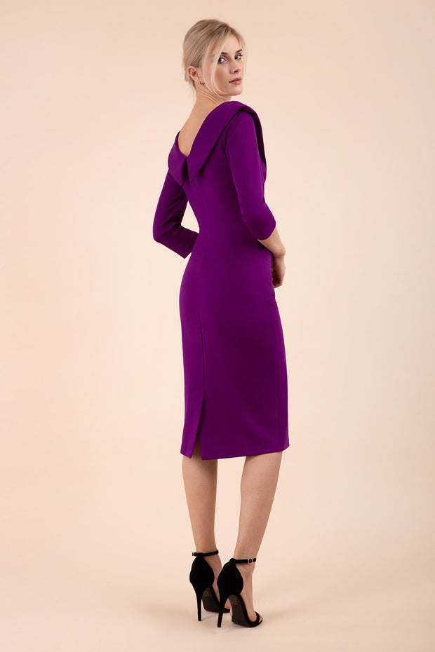 model is wearing diva catwalk eliza sleeved pencil dress with collared v-neck in purple back