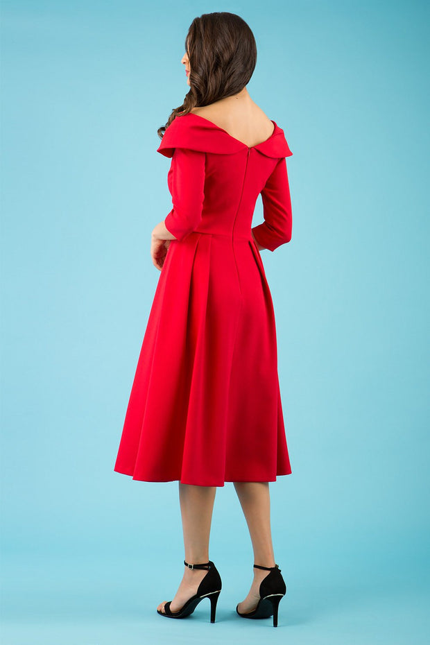 Model wearing Diva Catwalk Chesterton Sleeved dress with oversized collar detail and a-line swing pleated skirt in colour red back