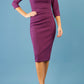 model is wearing diva catwalk ubrique pencil dress with sleeve and keyhole detail on a front panel in imperial purple front