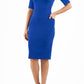 Model wearing Diva catwalk Derwent Pencil skirt dress with shoulder pads and short sleeves and pockets on both sides and empire waistline in royal purple front