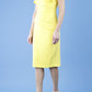 model wearing diva catwalk Bodiam Bodycon Pencil Dress with frill sleeves in knee length and pleating across the tummy in blazing yellow front