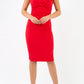 Model is wearing an off shoulder pencil dress by Diva Catwalk in red
