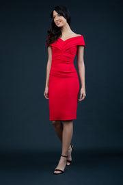 Model is wearing an off shoulder pencil dress by Diva Catwalk in red