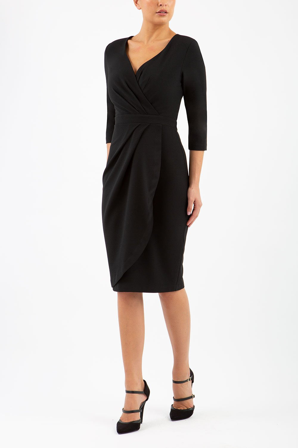 model wearing diva pencil dress tulip design with overlapping pencil skirt with 3 4 sleeves in colour black front 