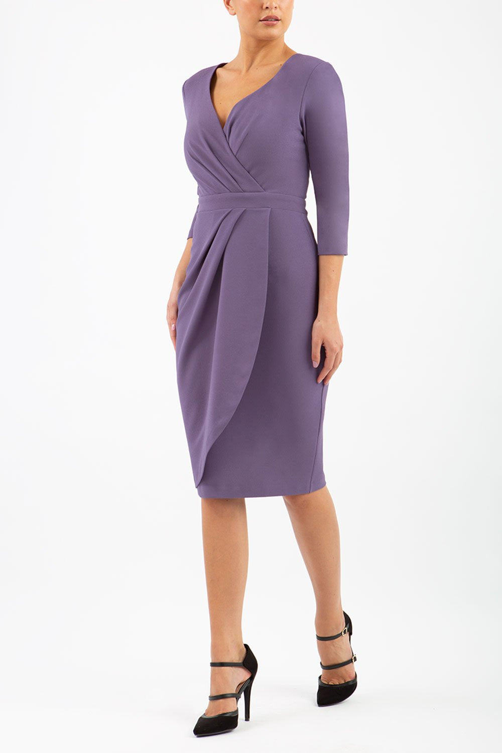 model wearing diva pencil dress tulip design with overlapping pencil skirt with 3 4 sleeves in colour dark mauve front 