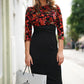 Model wearing the Diva Chiltern Print dress with round neckline in autumnal print front image