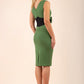 blonde model wearing Diva Catwalk Pencil sleeveless dress with rounded neckline and bow detail at the front with a contrasting black band in vineyard green back
