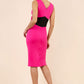 blonde model wearing Diva Catwalk Pencil sleeveless dress with rounded neckline and bow detail at the front with a contrasting black band in hibiscus pink back