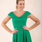 blonde model wearing diva catwalk Chesterton Swing Sleeveless dress in emerald green front