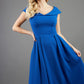 model is wearing divacatwalk Chesterton Sleeveless a-line swing dress in cobalt royal blue with oversized collar front